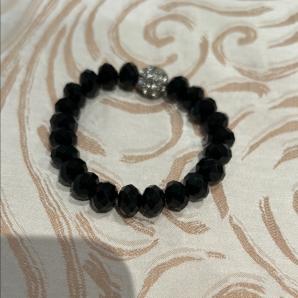 Black beaded bracelets 
7.5 inches approximately